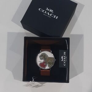 Coach Women Watch with Brown Strap and Dinosaur Motif. Coach Perry Watch